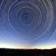 Star Trails in the Sky above the landscape
