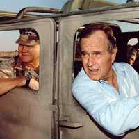 Norman Schwarzkopf, Jr. and President George H. W. Bush visiting troops during the Gulf War