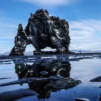 Large rock structure among the tide pools in Hvitserkur, Iceland