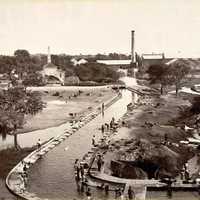 Mill with a canal connecting to Hussain Sagar lake in the 1880s in Hyderabad, India
