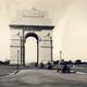 Armoured cars passing through India Gate in 1930s in Delhi