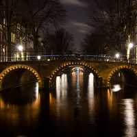 Bridge and Canals at Night, Amsterdam, Netherlands