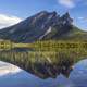 Sukakpak Mountain and reflective Lake in Alaska