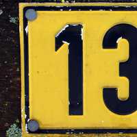 Number 13 on a road sign thirteen