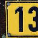 Number 13 on a road sign thirteen