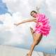 dancer-jumping-in-funny-pink-costume