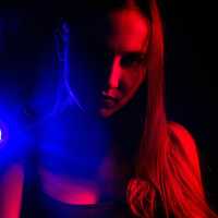 girl-dark-room-in-blue-and-red