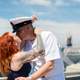 navy-veteran-couple-kissing-home-from-deployment