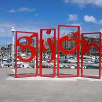 Modern piece of art with the city name in Gijon, Spain