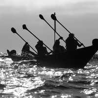 People rowing a canoe in Channel Islands National Park, California