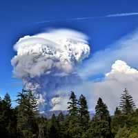 Mushroom Smoke Cloud rising up from the forest fire