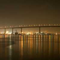 Bridge and skyline at night in San Diego, California