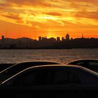 Sunset over the skyline and cars in San Francisco, California