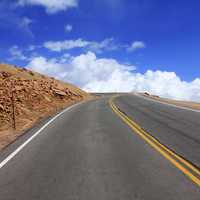 Roadway and blue sky at Pikes Peak, Colorado