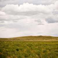 Landscape and mound with clouds in Montana