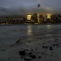 New York City Skyline under dark storm clouds
