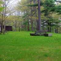 Bench with grassy field at Council Grounds State Park, Wisconsin