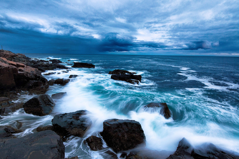 Waves Of The Ocean Crashing On Shore With Skies In Acadia National Park