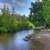 Parks steps down the Mississippi River at lake Itasca state park ...